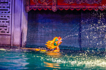 Traditional Vietnamese water puppet dolls theatre show in Hanoi, Vietnam, water puppetry doll show, in Thang Long theatre , one of the most traditional water puppet show in Hanoi, Vietnam.