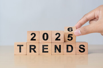 Changing wooden block from 2025 to 2026. Symbol of upcoming trends, innovation, and strategic shifts in business, tech, and lifestyle