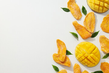 Dried mango chips with fresh sliced mango