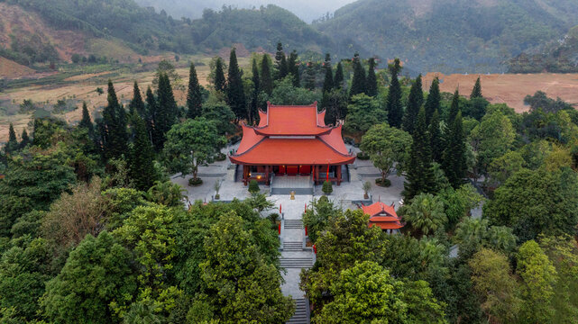 Aerial or distant panoramic views of the Dinh Hoa Safe Zone (ATK), a historic revolutionary base nestled in the mountainous region.