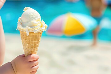 Beach Day Treat: Child's Hand Holding Ice Cream Cone