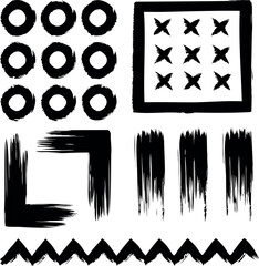A variety of abstract black brush stroke shapes on a white background