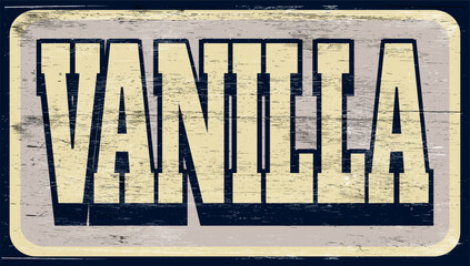 Aged and worn vanilla sign on wood