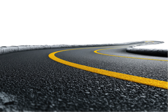 A curving asphalt road with a dashed yellow line, set against a black background, creating a sense of speed and motion.  The perspective is low and emphasizes the road's texture