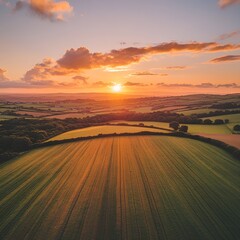 Evening light dances on Devon’s farmland quilt.