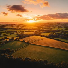 Evening light dances on Devon’s farmland quilt.