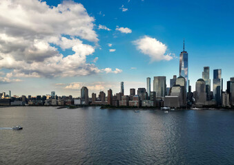 Obraz premium NYC skyline with skyscrapers aerial view. Manhattan and Brooklyn. New York City skyline with Hudson River views. Downtown NYC. New York from waterfront skyline. Panorama of of New York.