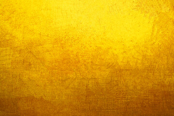 Old gold wall background or texture and shadow.