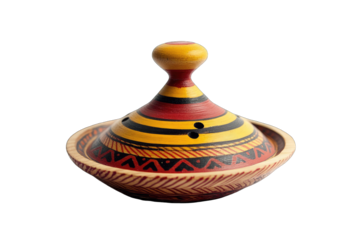 A hand-painted ceramic tagine lid, featuring vibrant red, yellow, and black stripes, and geometric patterns around the base.  The lid is conical with a small, round knob on top