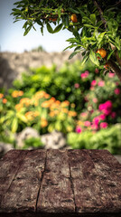 Fototapeta premium Rustic wooden tabletop with blurred garden background