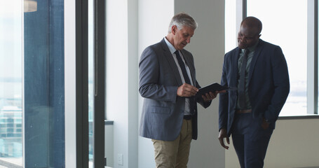 Office, document and meeting with business men for proposal, discussion or agenda. Paperwork, partnership and B2B contract with people for feedback, corporate review and networking or workshop