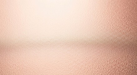 Textured rose gold metallic surface with a subtle sheen and fine-grained pattern, an elegant abstract background.
