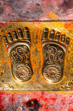 Ornate golden footprints at Durga Temple in Hampi, Karnataka, India