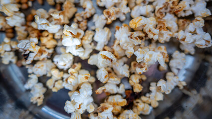 Freshly popped popcorn with golden kernels—crunchy, delicious, and perfect for movie nights....