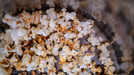 Freshly popped popcorn with golden kernels—crunchy, delicious, and perfect for movie nights. Taste the difference of homemade goodness in every bite