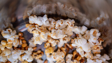 Freshly popped popcorn with golden kernels—crunchy, delicious, and perfect for movie nights. Taste the difference of homemade goodness in every bite
