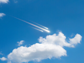 Meteor Shower Streaking Across a Blue Sky. Shooting stars in daylight above the clouds.
