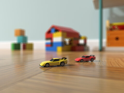 Toy cars on a wooden floor in a playroom with colorful blocks in the background