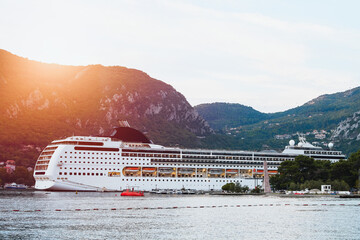 Large cruise liner sailing in scenic Kotor Bay