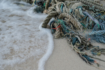 Old nautical ropes left on the beach