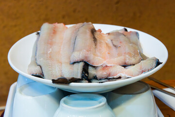 raw eels on the dish for BBQ