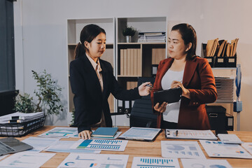 Business meeting time. Business man and business woman working on startup project.
