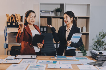 Business meeting time. Business man and business woman working on startup project.
