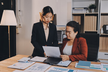 Business meeting time. Business man and business woman working on startup project.