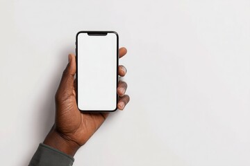 A man hand holding an phone with a white screen on the table, top view, isolated on a clear background. Mockup for an ad with text overlay.