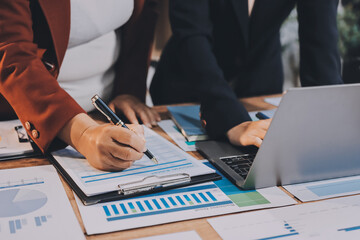Business meeting time. Business man and business woman working on startup project.