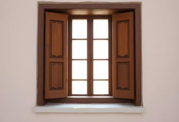 Obraz premium Small wooden window set into plain beige stucco wall