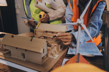 Engineers are helping to design work on blueprints and collaborate on structural analyzing of project types.