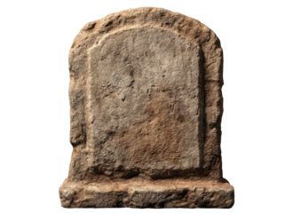 Ancient weathered stone stele with worn inscription isolated against a black backdrop