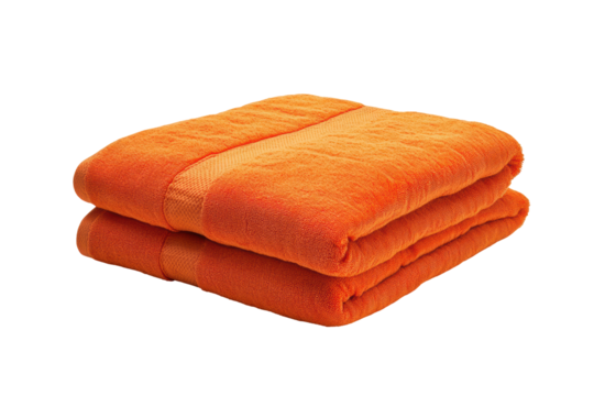 Two neatly folded, vibrant orange towels, plush and thick, displayed on a white background