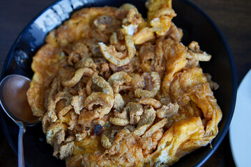 Crispy pork rind Omelet in plate