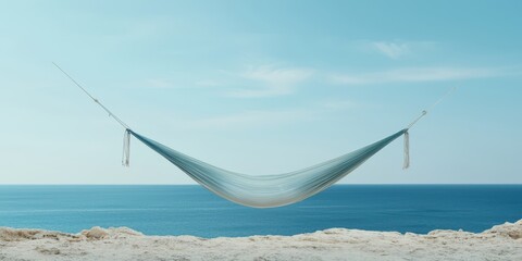 relax hammock beach concept. A serene hammock suspended over a tranquil ocean view under a clear blue sky.