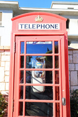 Old British telephone booth in a street of Gibraltar, Great Britain 