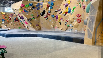 A modern climbing wall for sports. Mountaineering and rock climbing.
