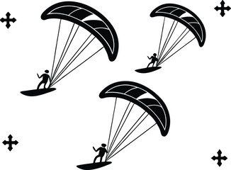 Three paragliders soaring in the sky with cross symbols