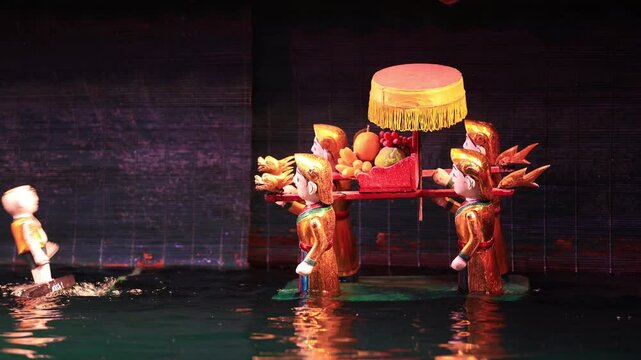 Traditional Vietnamese water puppet dolls theatre show in Hanoi, Vietnam, water puppetry doll show, in Thang Long theatre , one of the most traditional water puppet show in Hanoi, Vietnam.