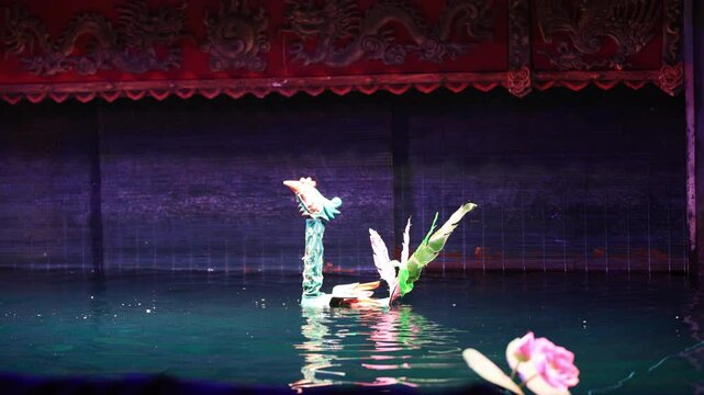 Traditional Vietnamese water puppet dolls theatre show in Hanoi, Vietnam, water puppetry doll show, in Thang Long theatre , one of the most traditional water puppet show in Hanoi, Vietnam.