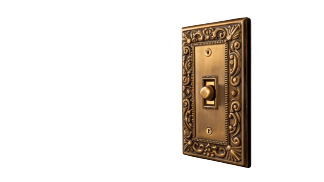 Close up of an ornate vintage brass dimmer switch with intricate detailing, set against a transparent background, showcasing its elegant design and antique charm