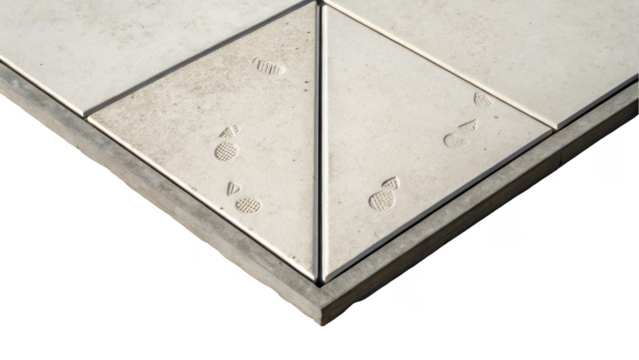 Tactile paving featuring footprints and directional arrows enhances accessibility and safety for visually impaired individuals navigating urban spaces