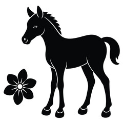 Obraz premium A black silhouette of a young horse standing beside a flower in a simple illustration