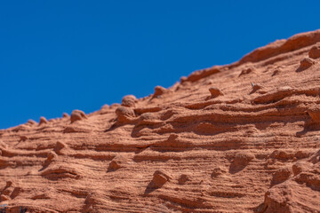 Fototapeta premium Aztec Sandstone, Early Jurassic geological formation of primarily eolian sand . Valley of Fire Road / Highway / State Park, Clark County, Nevada geology. Weathering. Beehive rock formations