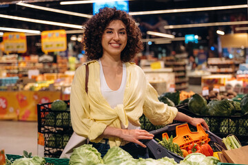 Gorgeous woman is in the grocery store