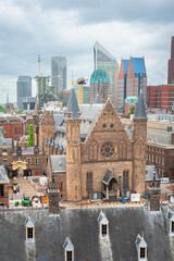 The Hague, Netherlands - May 25, 2025: View of the Binnenhof, political centre of The Netherlands in The Hague. In the background skyscrapers in the vicinity of The Hague Central Station.