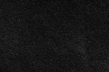 Close-up of black volcanic sand background backdrop.  Use for desert or beach background concept
