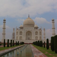 The Taj Mahal is an ivory-white marble mausoleum on the right bank of the river Yamuna in Agra, India. It was commissioned in 1631 by the fifth Mughal emperor, Shah Jahan.