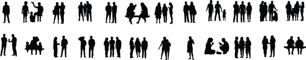 A silhouette of various individuals, with several pairs engaged in discussion, captures the subtle nuances of human connection and interaction in a candid display.